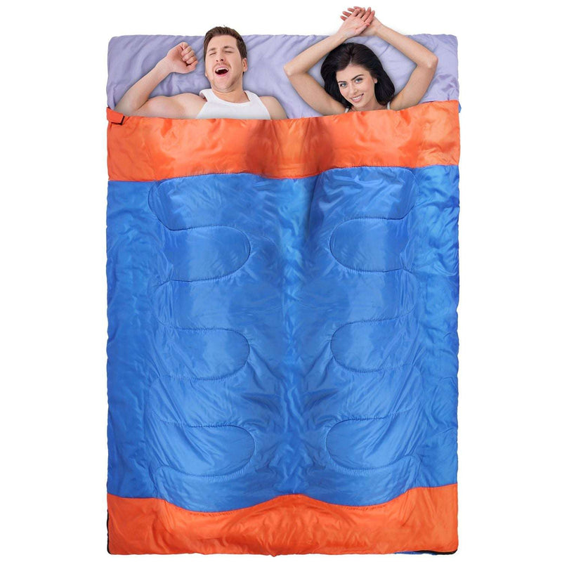 Two people sleeping together on a sleeping bag